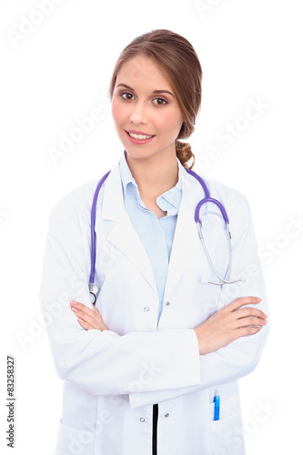 Friendly smiling young female doctor  isolated 