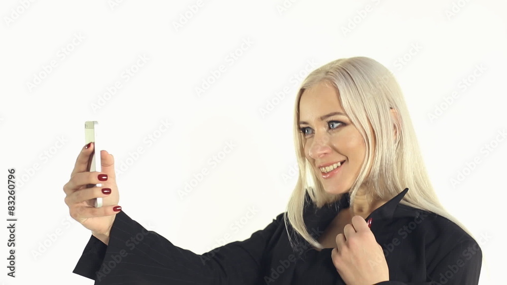 Close-up of business lady doing selfie photo on a white Close-up of business lady doing selfie photo on a white