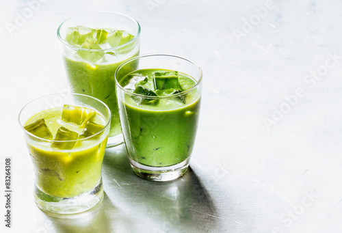 Healthy Green Smoothie Shakes in Drinking Glasses