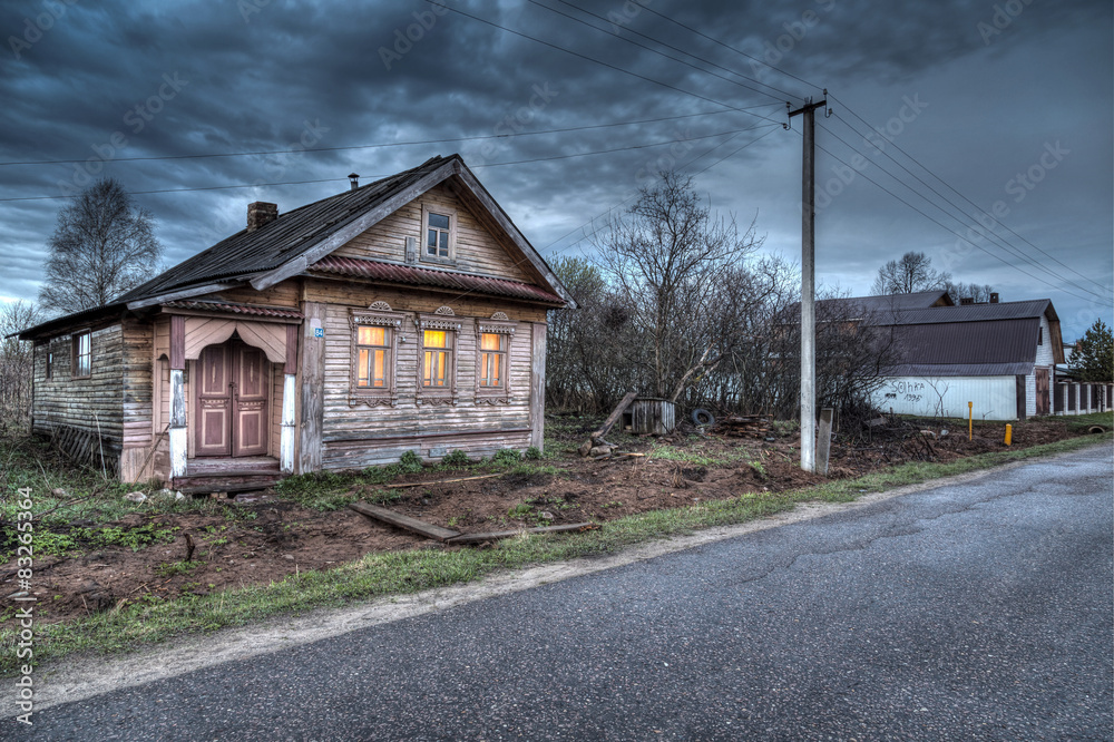 Evening street in the Russian village. Evening street in the Russian village.