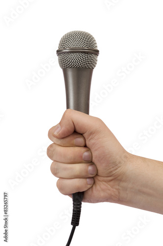 male hand holding a microphone photo