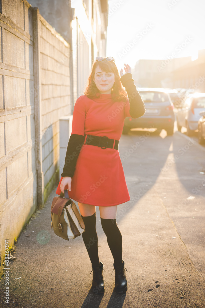 young beautiful red dressed vintage hipster woman