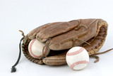 baseball glove and balls on white background