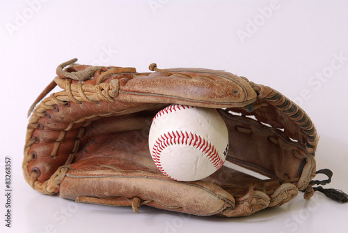 baseball glove and balls on white background