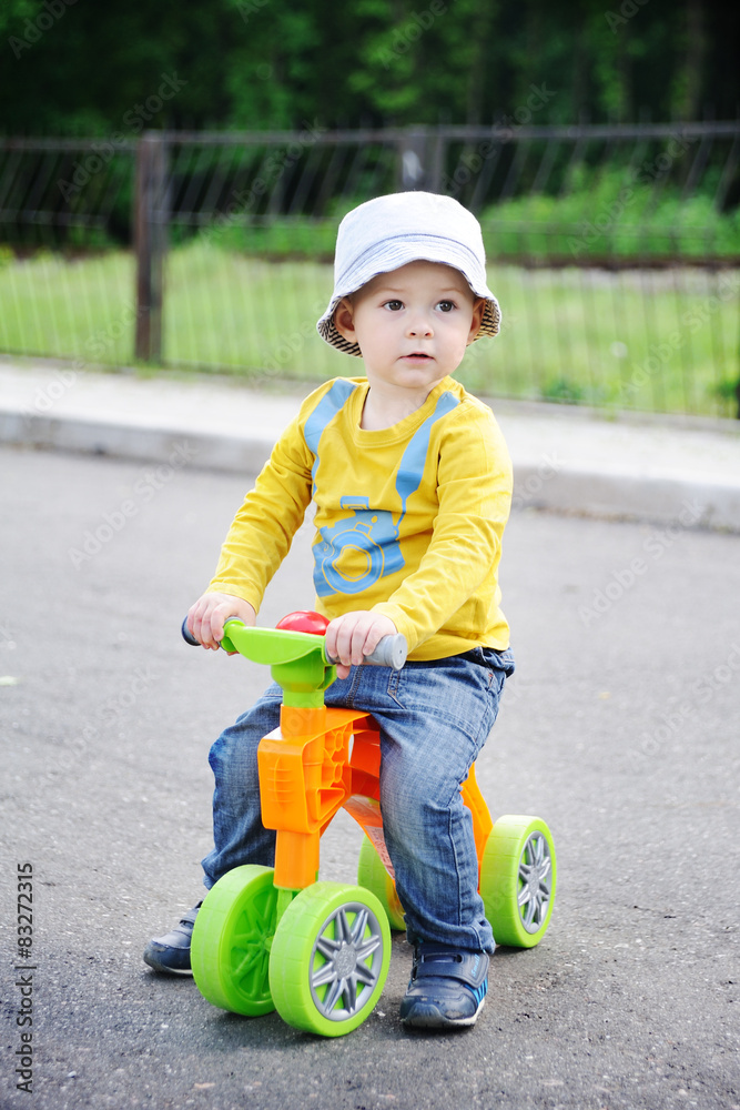 little boy on the color of bicycles little boy on the color of bicycles