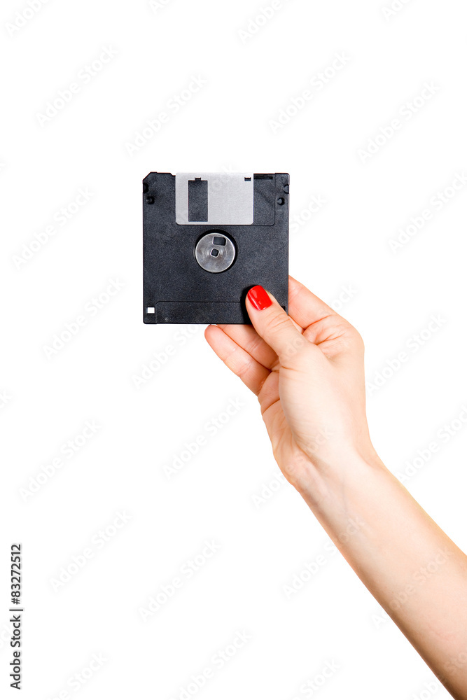 Hand with computer floppy disk isolated on white background Hand with computer floppy disk isolated on white background