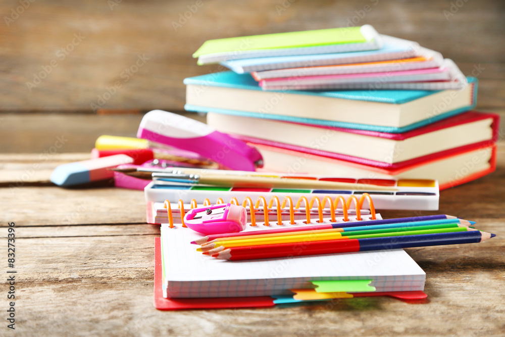 Fototapeta premium Bright school stationery on old wooden table