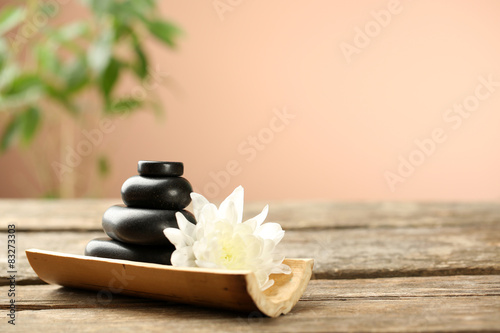 Beautiful spa composition on wooden table, on brown background
