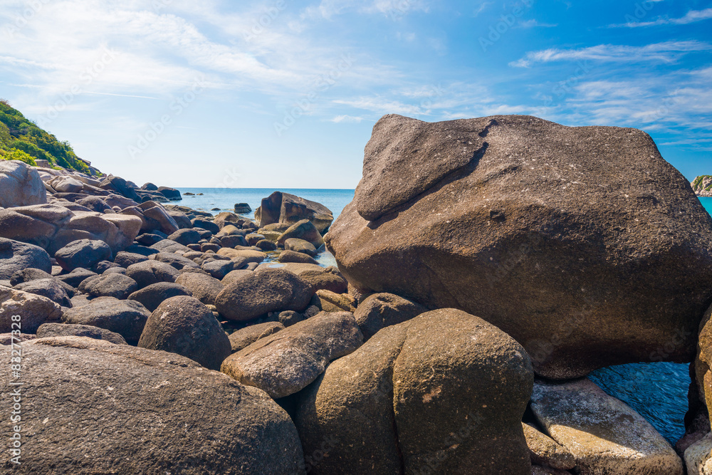 Rock beach and blue sky with beautiful clouds tropical sea Rock beach and blue sky with beautiful clouds tropical sea