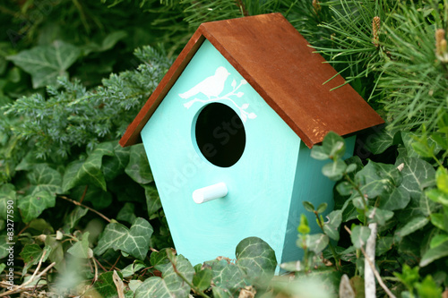 Decorative nesting box on green background