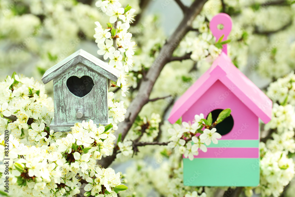 Decorative nesting boxes on bright background