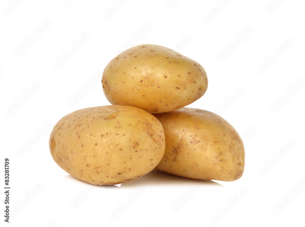 closeup unpeeled fresh potato on white background closeup unpeeled fresh potato on white background