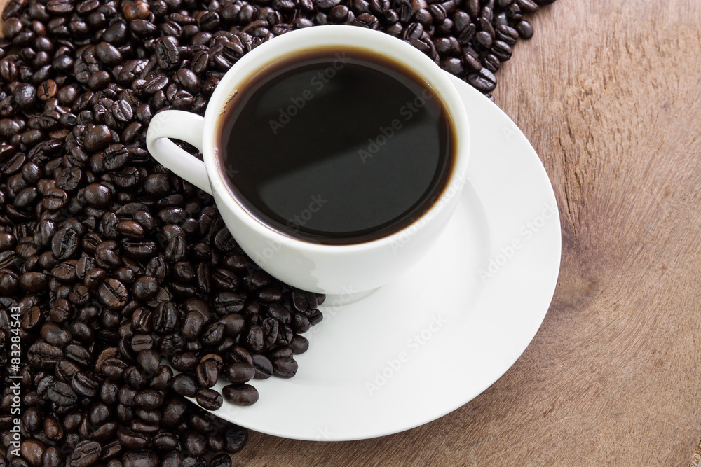 Fototapeta premium Coffee cup with beans
