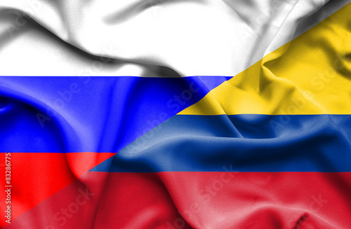 Waving flag of Columbia and Russia