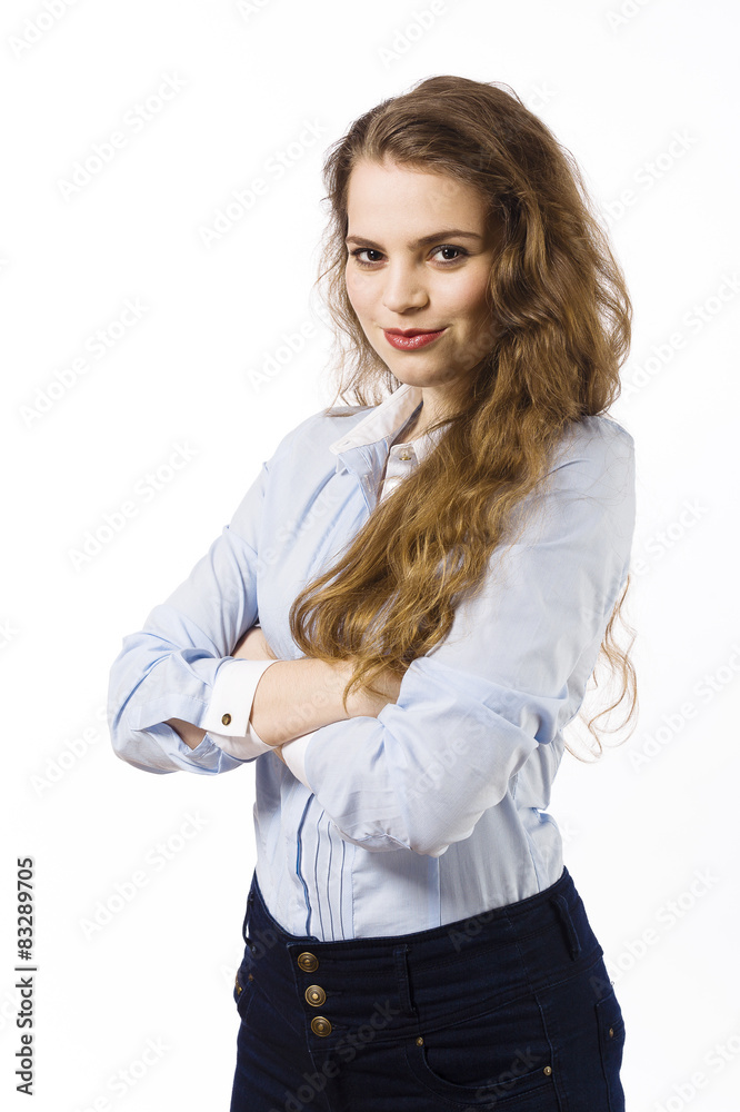 Portrait of a beautiful smiling young woman dressed in a blue sh Portrait of a beautiful smiling young woman dressed in a blue sh