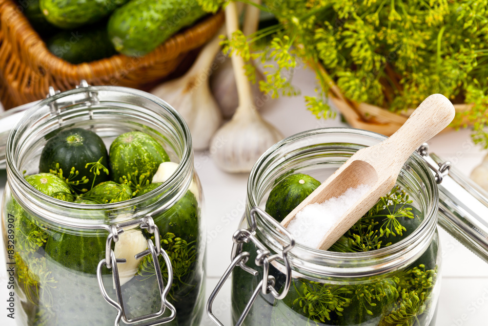 Homemade pickles in brine with garlic, dill and horseradish Homemade pickles in brine with garlic, dill and horseradish