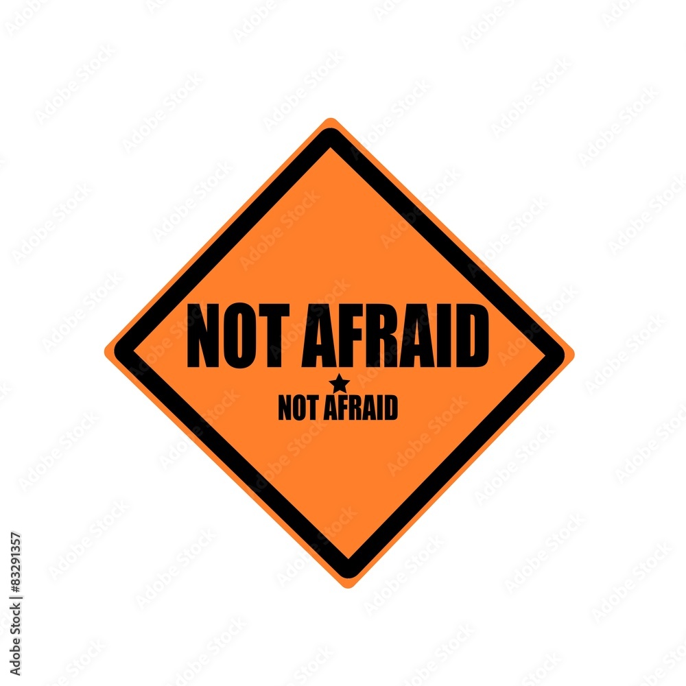 Not afraid black stamp text on orange background Not afraid black stamp text on orange background
