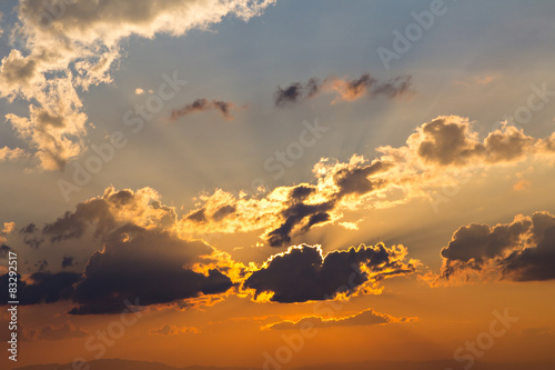 Clouds and sky with sun ray silhouetted on evening
