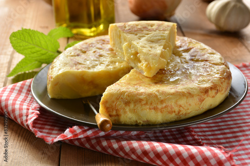 Spanish omelette with potato and egg photo