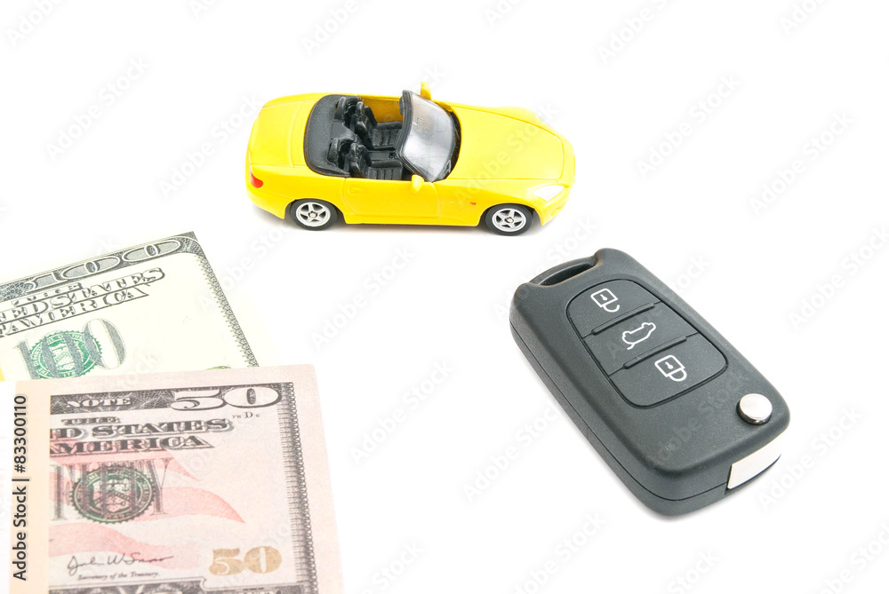 yellow car with keys and money