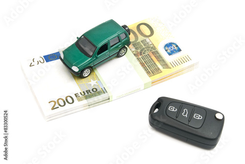 keys, green car and banknotes