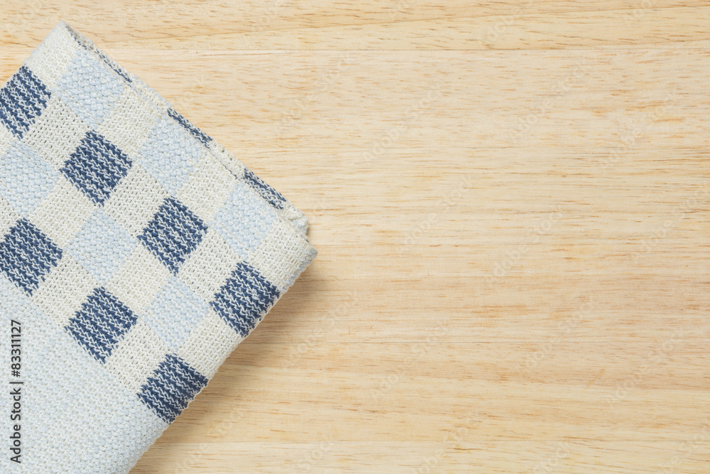Colored fabric on wooden background. Colored fabric on wooden background.
