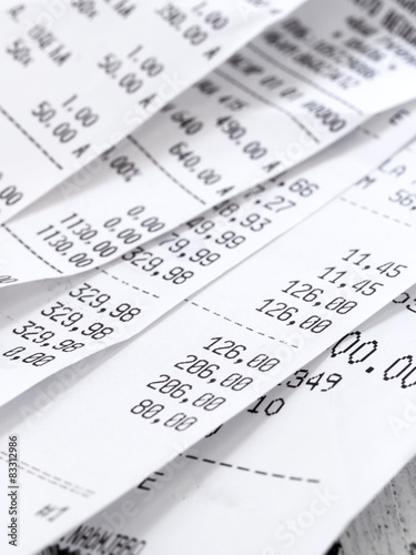 cash register receipts on the pile