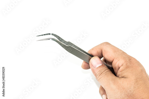 hand holding metal tweezers isolate