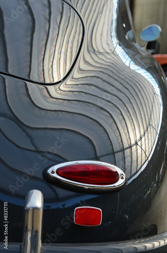 Obraz na płótnie Interesting form of old black car with original rear lamps stop w salonie