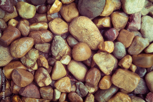 abstract background with dry round reeble sea stones