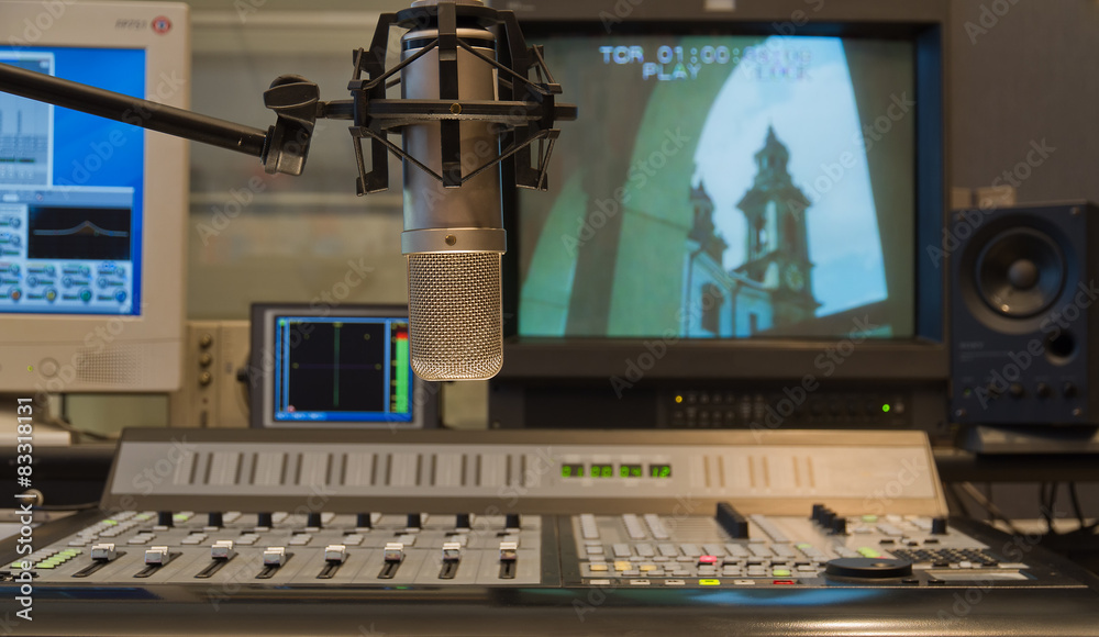 Condenser microphone in TV production studio interior