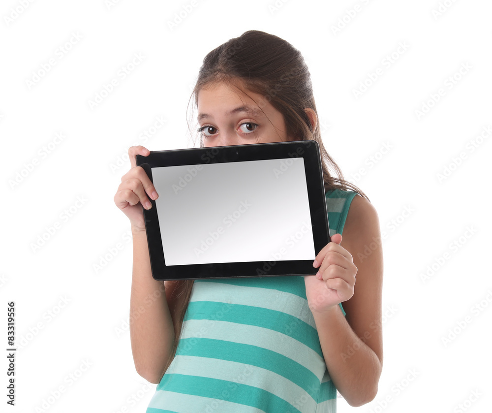 Beautiful pre-teen girl with a tablet computer. Isolated. Beautiful pre-teen girl with a tablet computer. Isolated.