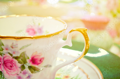 Antique floral tea set macro shot