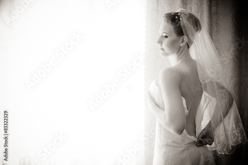 Bride getting ready. beautiful bride in white wedding dress with