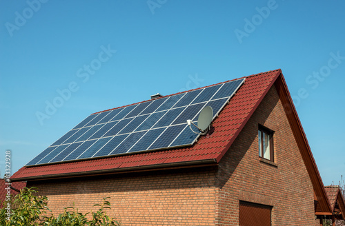 Solar panel on a red roof