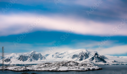 Beautiful snow-capped mountains in Antarctica © Goinyk