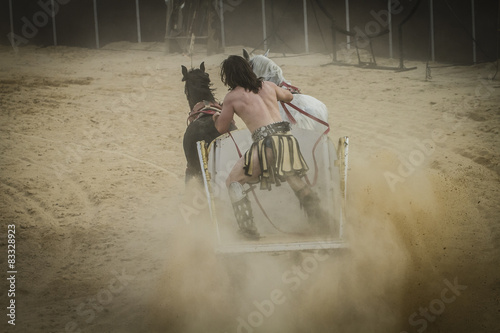 Empire, chariot race in a Roman circus, gladiators and slaves fi photo