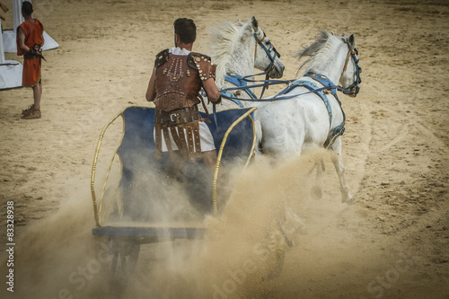 chariot race in a Roman circus, gladiators and slaves fighting photo