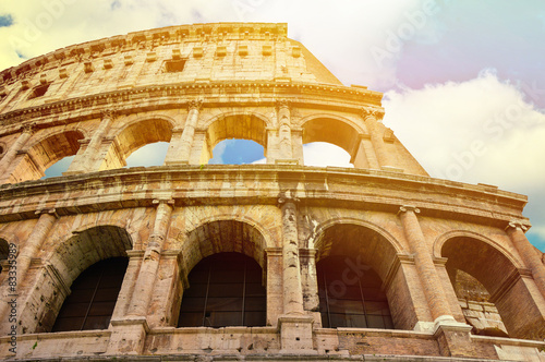 Billede på lærred Coloseum against bright bluse sky in Rome Italy