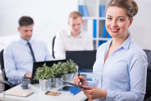 Slika na platnu Businesswoman and her co-workers