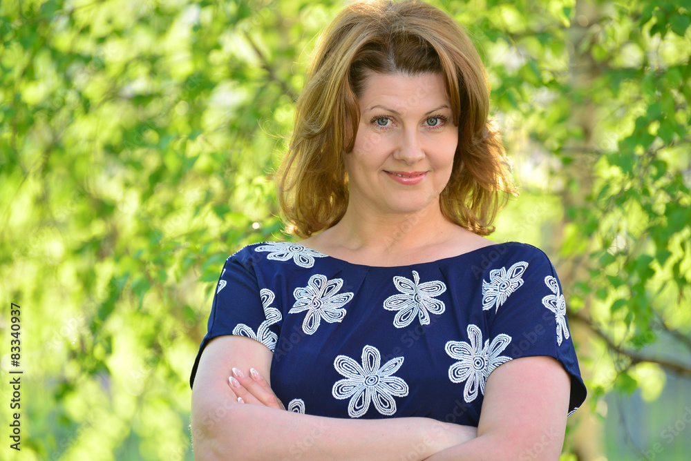 adult elegant woman on the nature in  summer