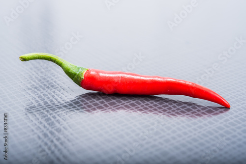 chili pepper on a black texture