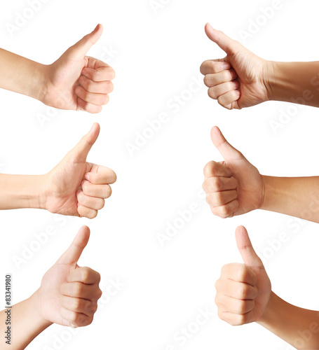 Human hands showing thumbs