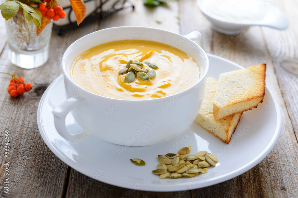 Pumpkin cream soup decorated with seeds Pumpkin cream soup decorated with seeds