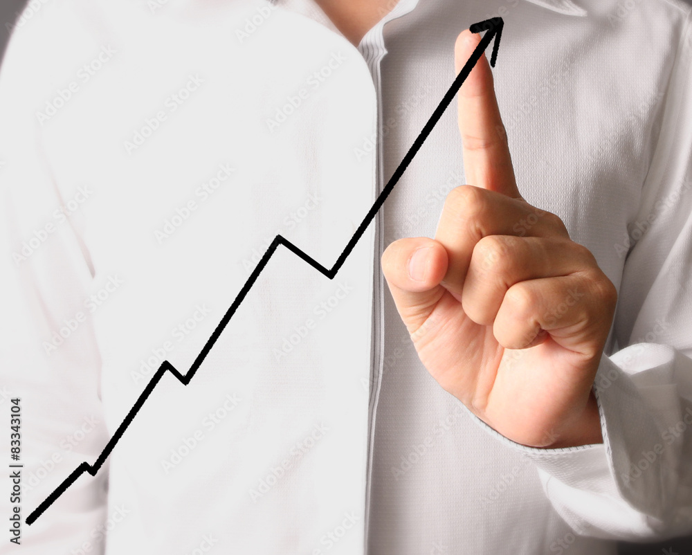 Businessman Touching a Graph Businessman Touching a Graph