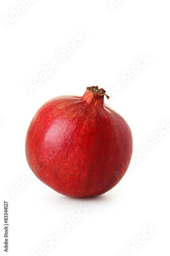 Delicious pomegranate fruit isolated on white