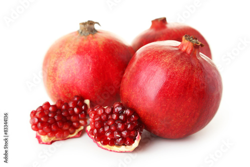 Delicious pomegranate fruit isolated on white
