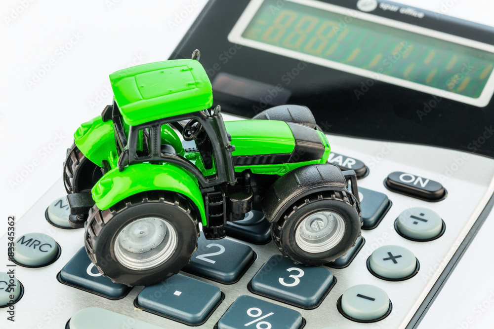 Naklejka premium Traktor und Taschenrechner