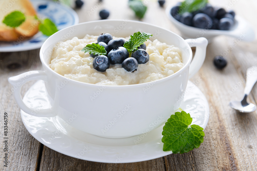 Tasty breakfast: rice pudding with blueberry Tasty breakfast: rice pudding with blueberry