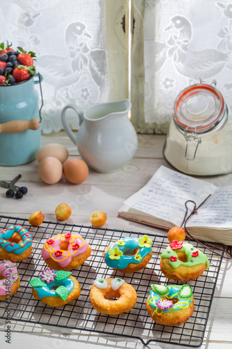 Decorating sweet and tasty donuts